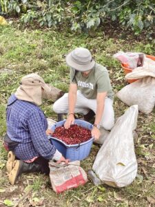 Diego Robelo and Picker with coffee cherries